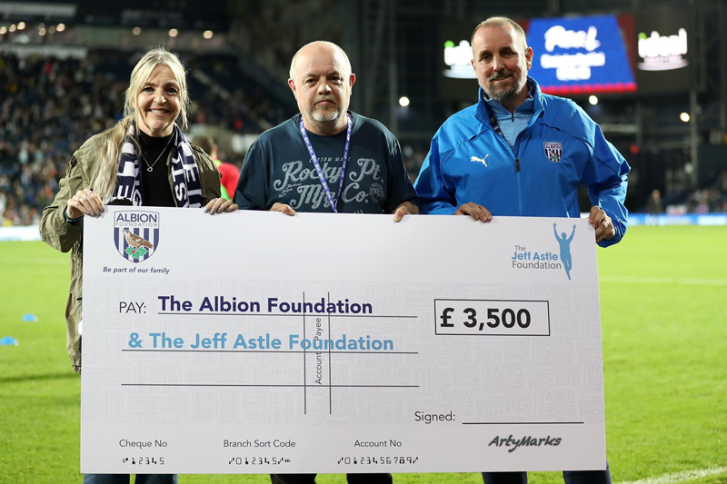Presentation night - pitch side at the Hawthorns with the two charities